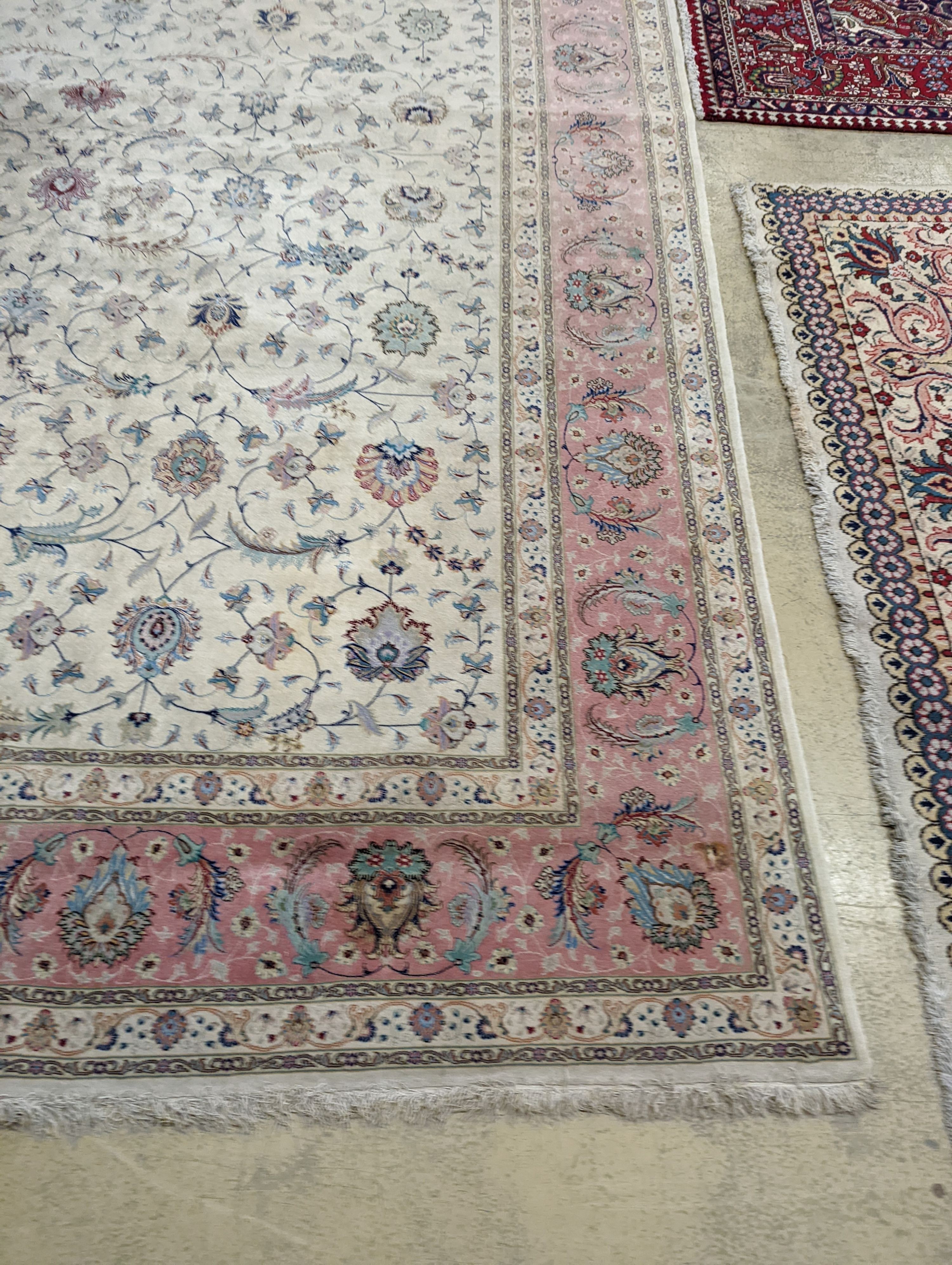 A Persian Tabriz ivory ground carpet, 410 x 300cm